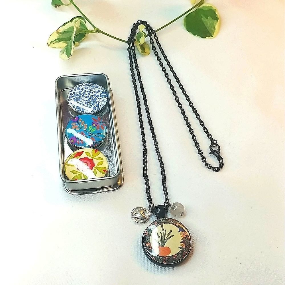 Vintage magnetic charm necklace. 26 inch. Comes with 4 charms.